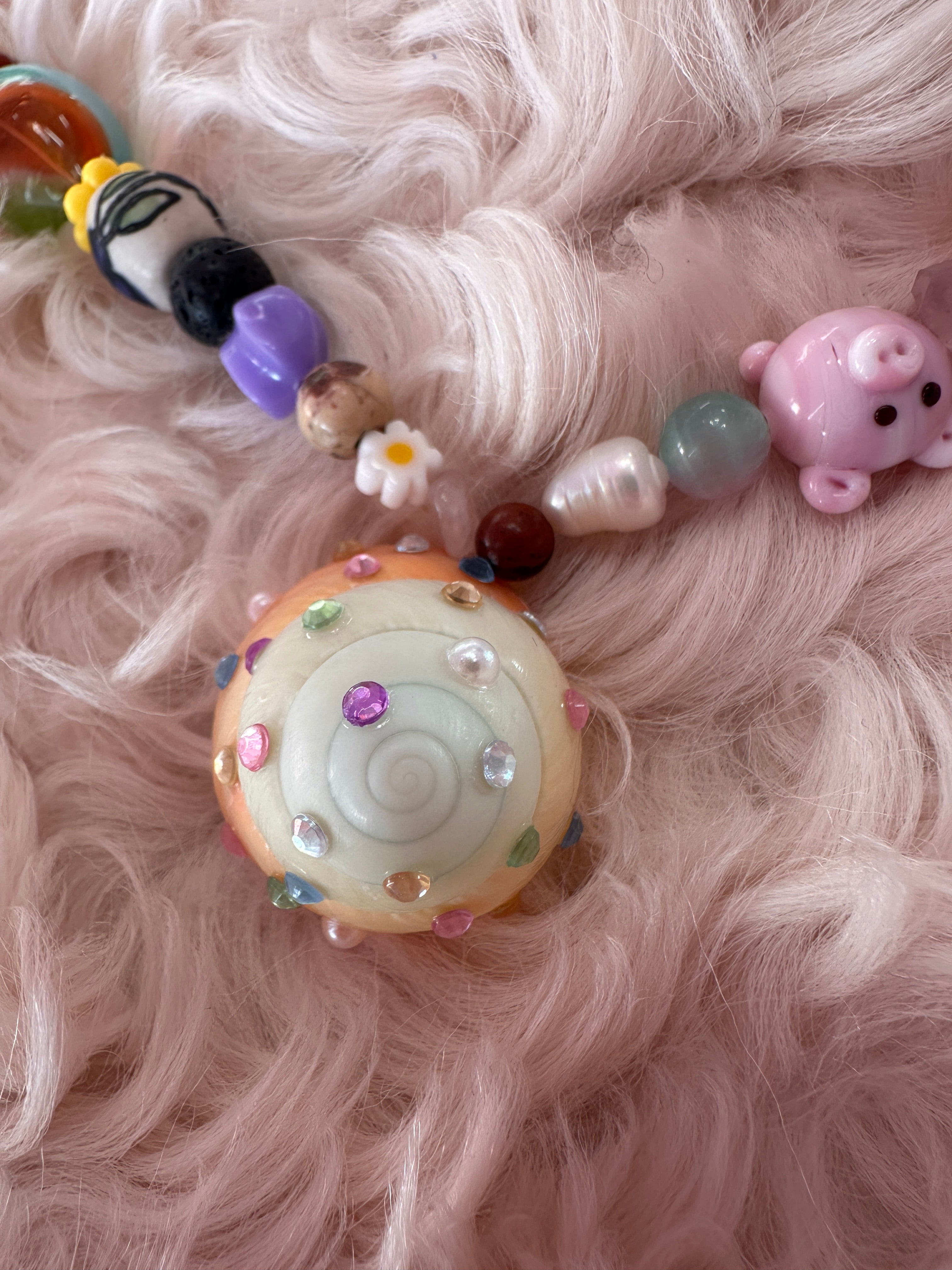 The one with the piglet and the multicoloured rhinestone shell part 2