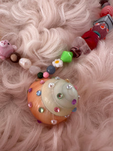 The one with the piglet and the multicoloured rhinestone shell part 3